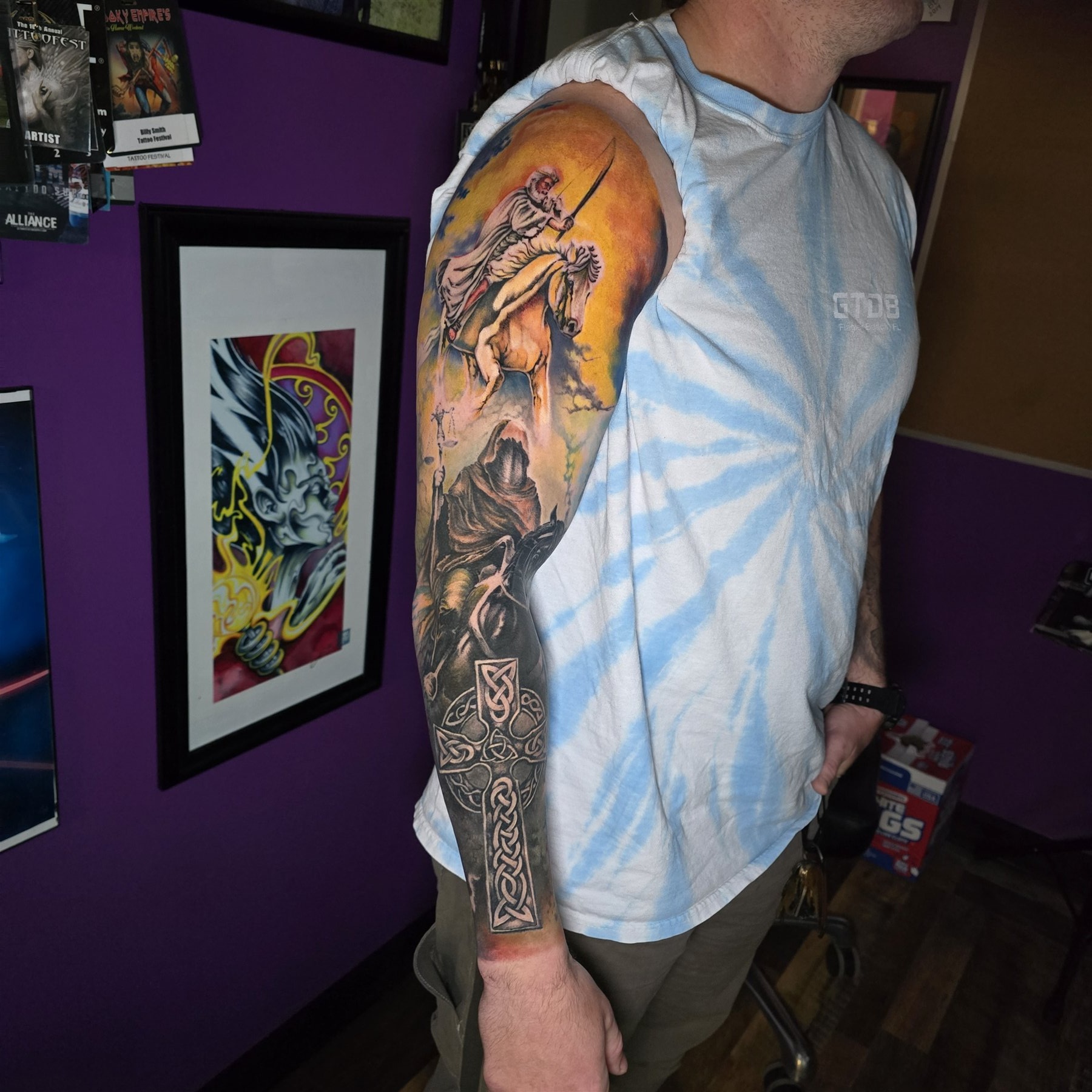 Full color fantasy rider and Celtic sleeve tattoo by Billy Smith