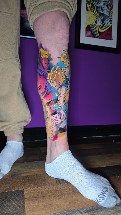 Outer view of a full color Dragon Ball Z leg sleeve tattoo by Billy Smith