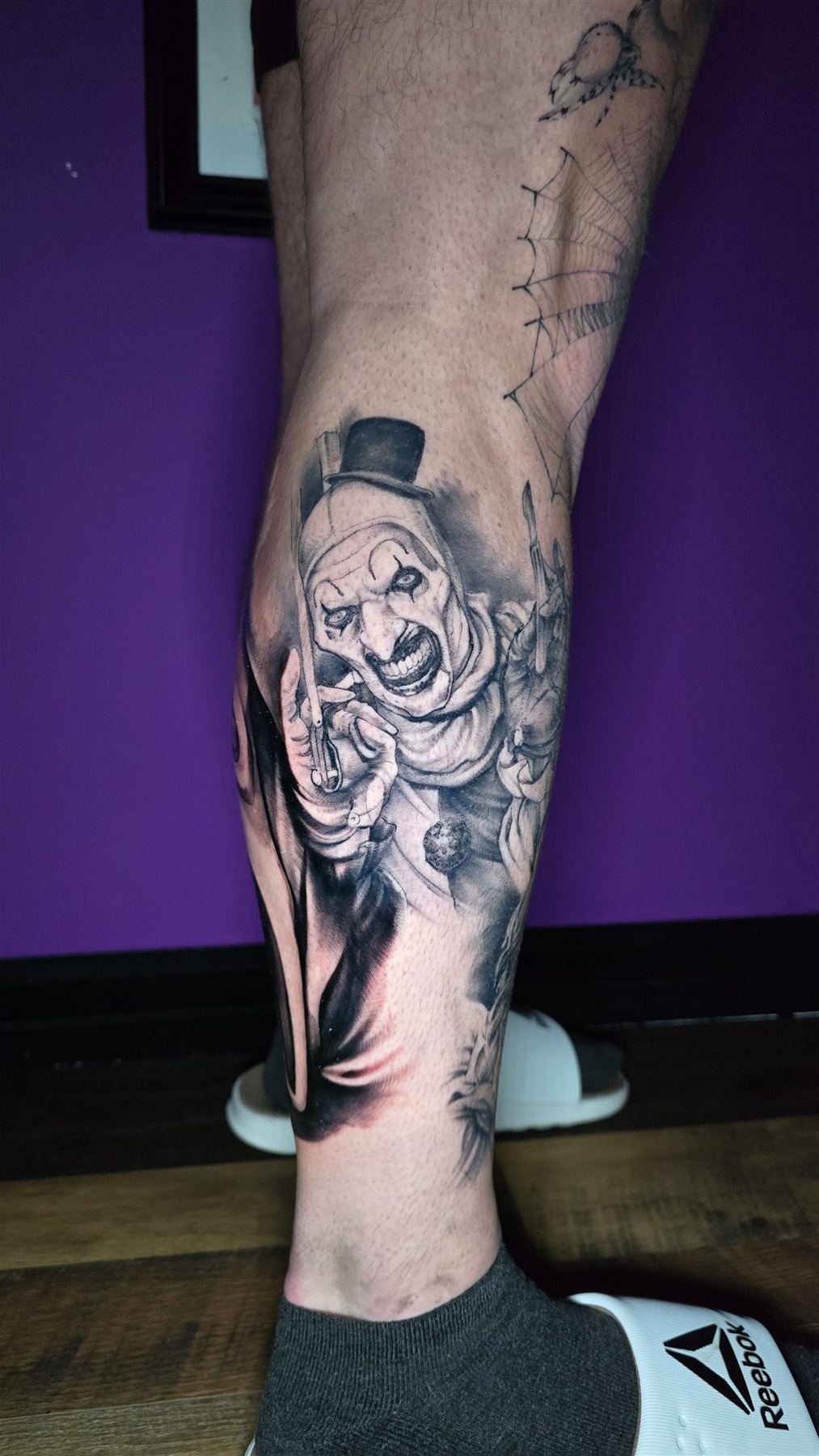 Black and grey Art the Clown tattoo by Billy Smith